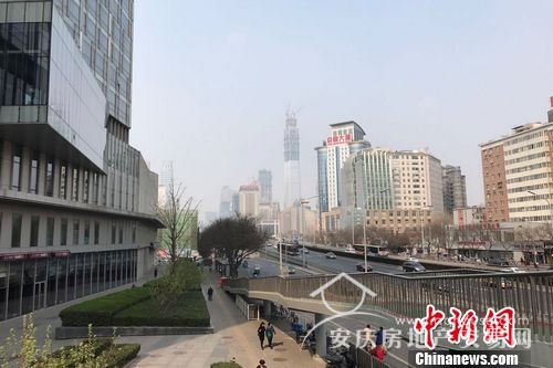 圖為北京雙井附近的寫字樓和居民住宅樓。 中新網(wǎng) 程春雨 攝